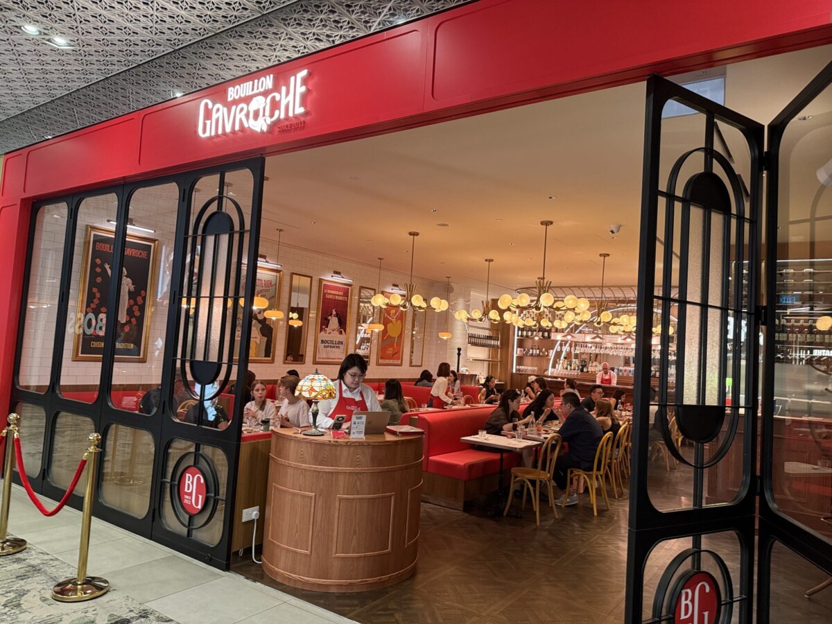 Red facade and art-deco black doors of Bouillon Gavroche at Mandarin Gallery, Orchard Road