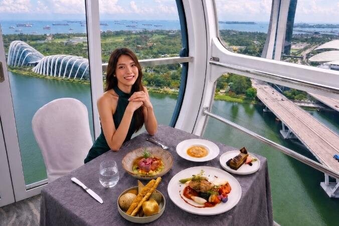 Solo diner at 165 Sky Dining by Singapore Flyer with Marina Bay views