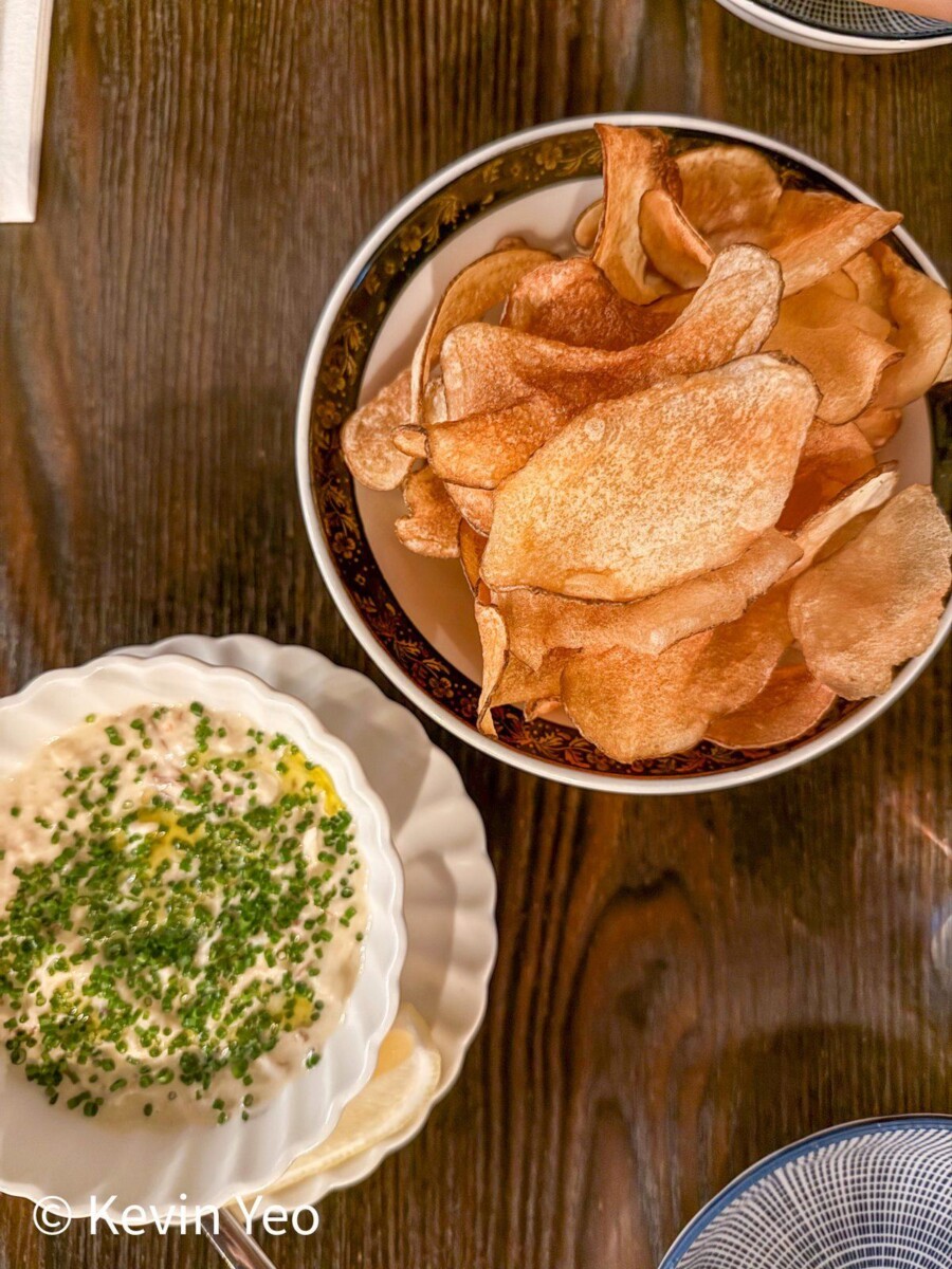 Hand-cut russet potato chips and flower crab XO mayo dip at 808 Eating House