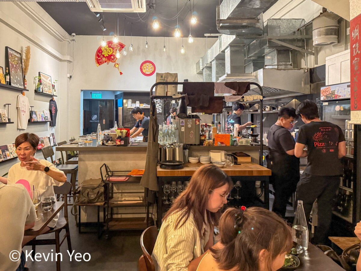 Casual dining room and open kitchen inside 808 Eating House Joo Chiat