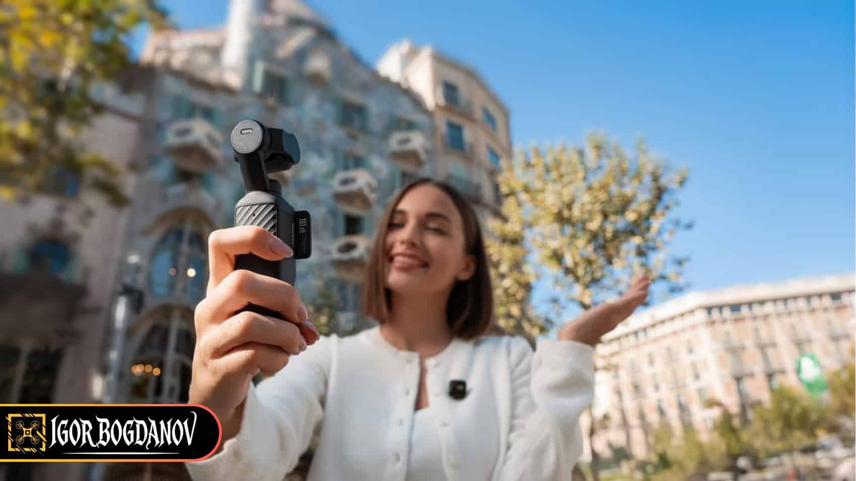 Woman holding DJI Osmo Pocket 4 while vlogging outdoors in a European city