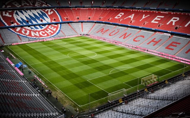 Allianz Arena, home of Bayern Munich FC, lit up in red