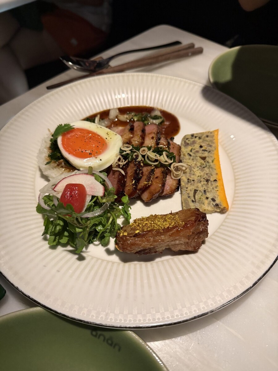Com Tam Saigon grilled pork broken rice with gold flakes, soft egg and sesame cracker at Anan Saigon