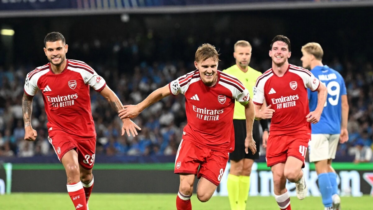Martin Odegaard celebrates after scoring for Arsenal against Napoli