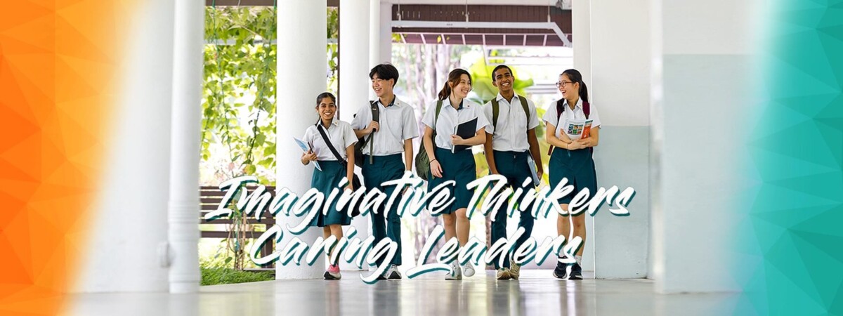 ASRJC students walking campus corridor in school uniform