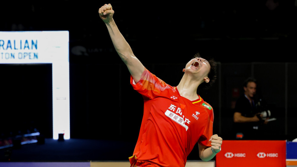 Feng Yan Zhe and Huang Dong Ping celebrate winning the Australian Open 2026 mixed doubles final