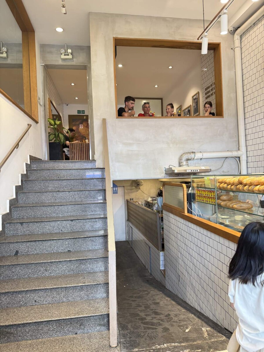 Two-storey air-conditioned seating area upstairs at Banh Mi 362 Saigon
