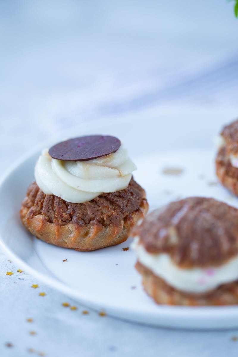 Freshly filled cream puffs similar to Beard Papa's popular custard cream puffs