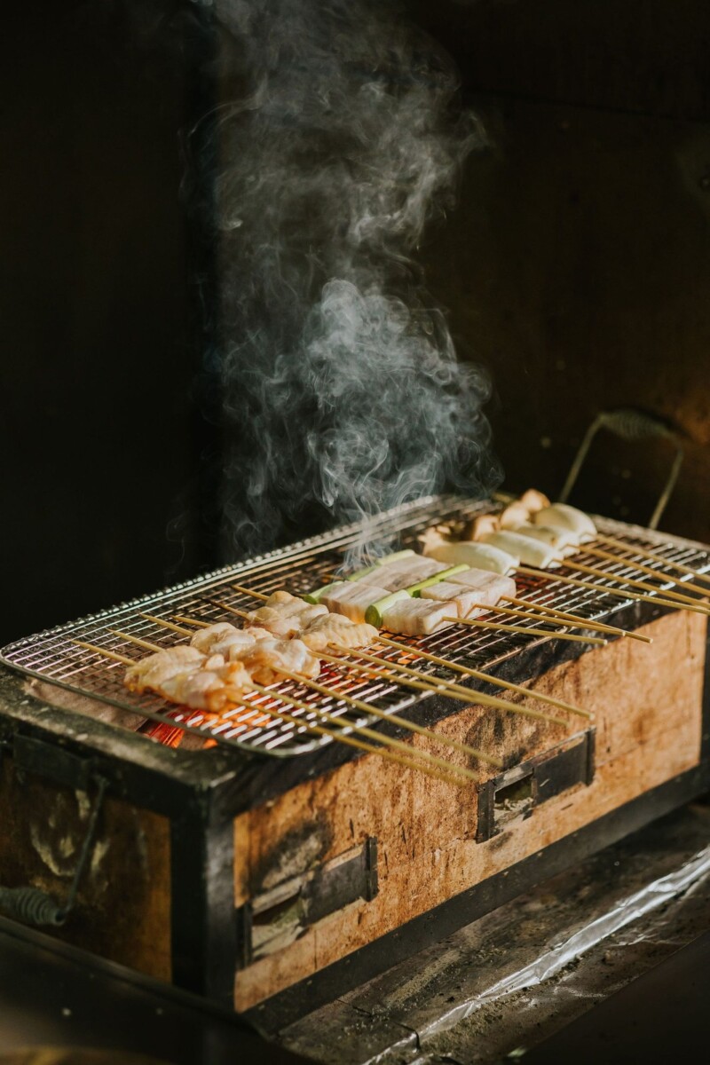 Charcoal grill with skewers in the Botanico kitchen at The Summerhouse