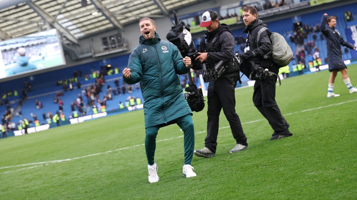 Brighton captain Lewis Dunk and teammates on the pitch after beating Crystal Palace