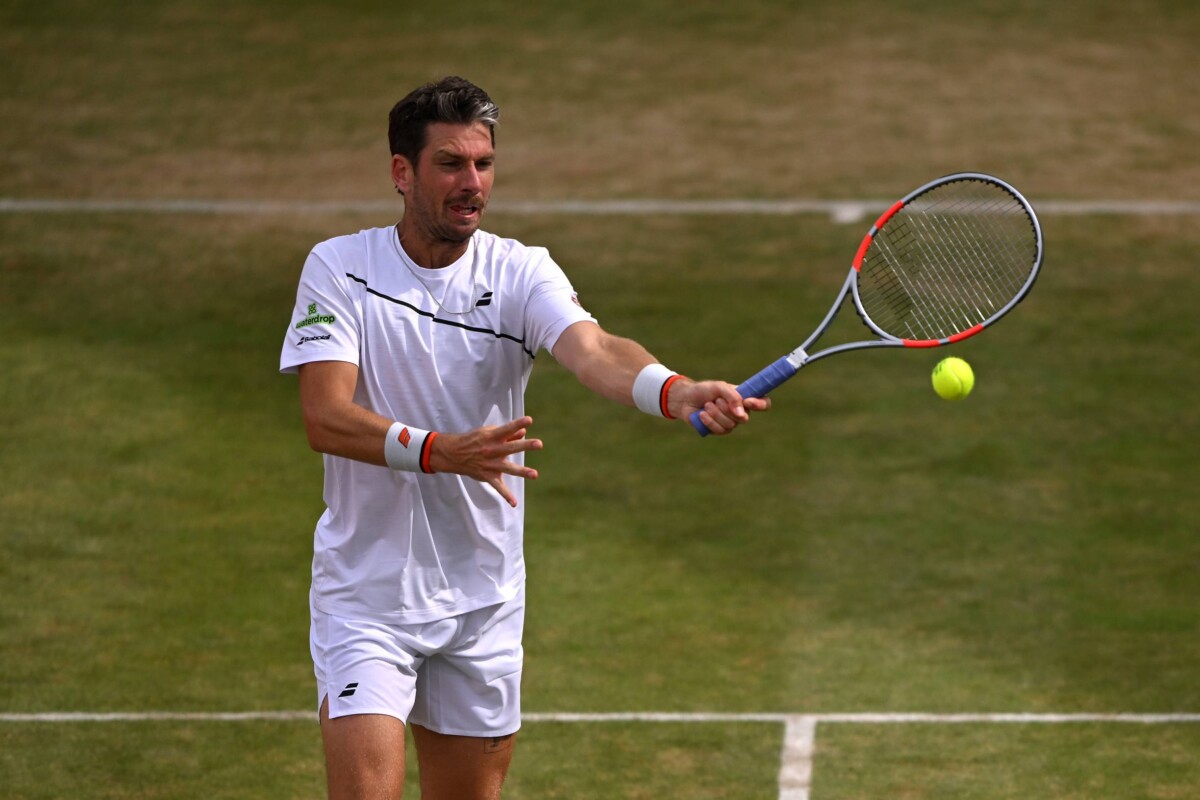 Cam Norrie in action during his first-round defeat at the 2026 HSBC Championships at Queen's Club