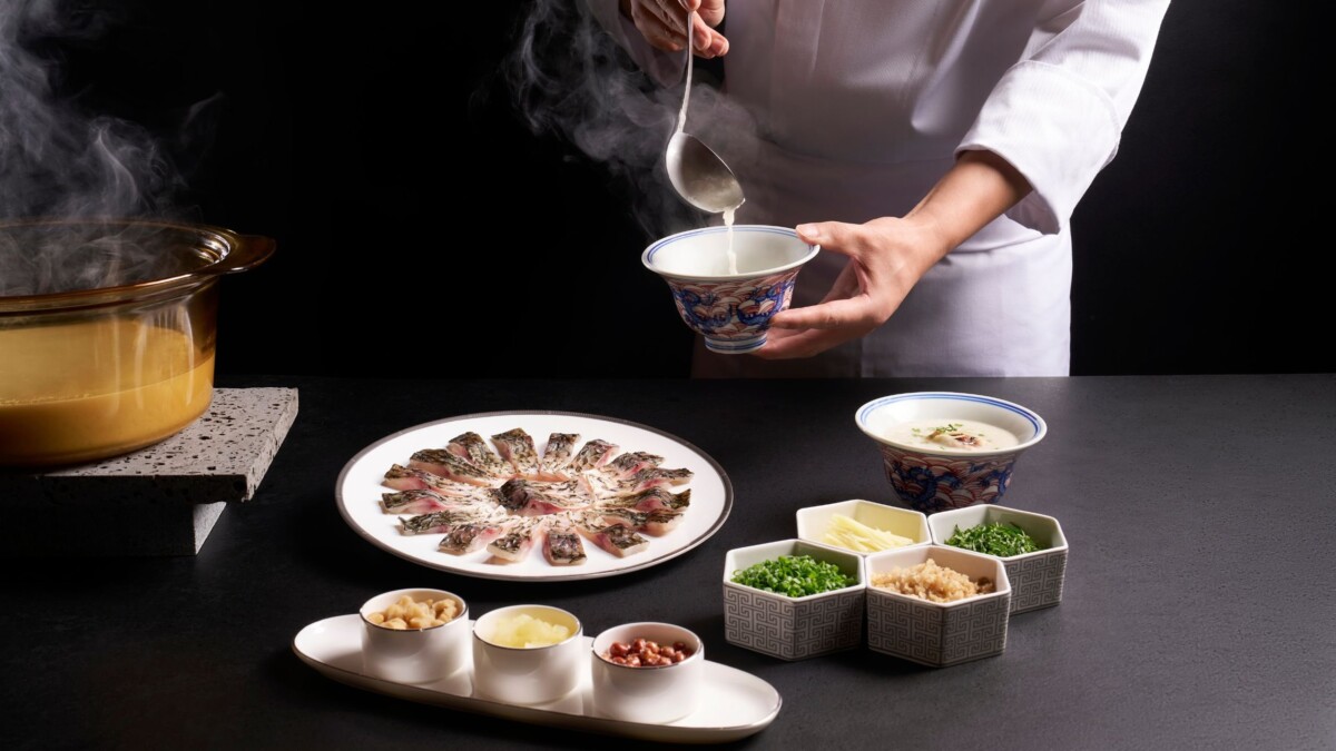 Boneless crucian carp congee served tableside at Cherry Garden