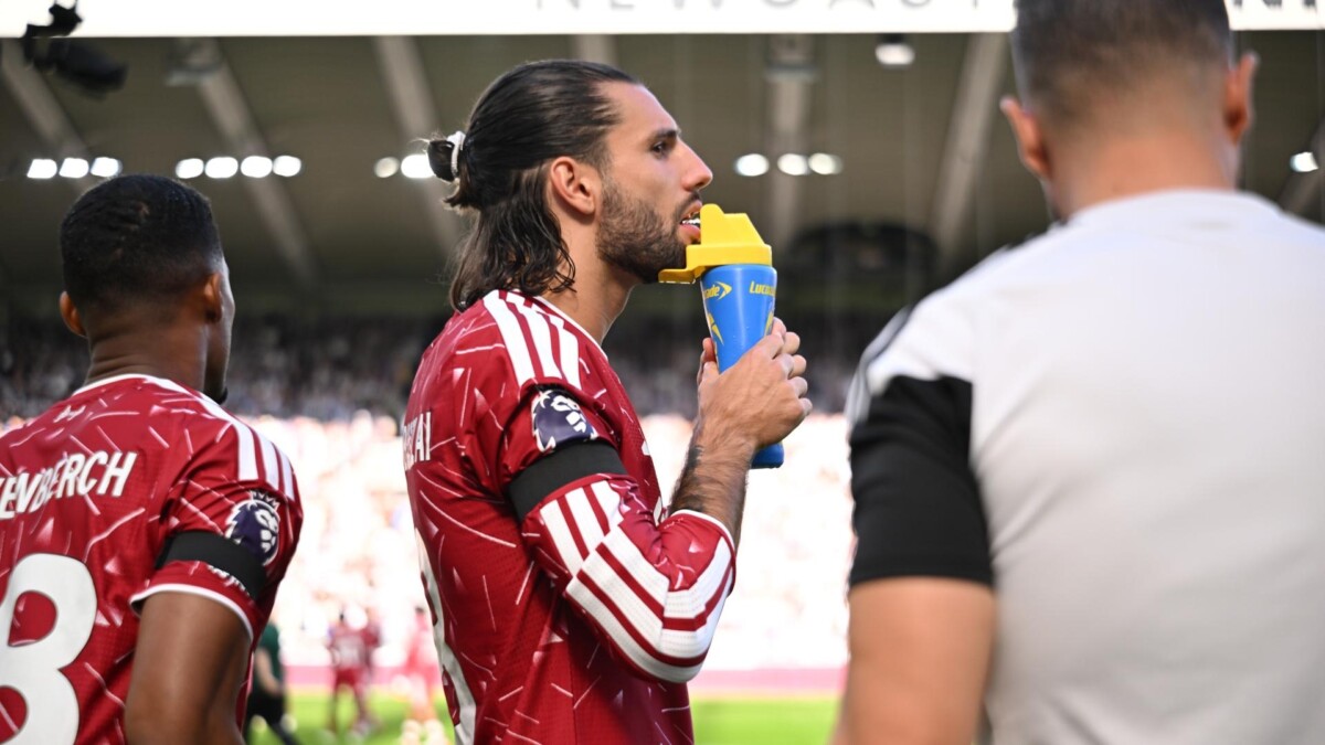 Dominik Szoboszlai of Liverpool drinks from a bottle during a Premier League match