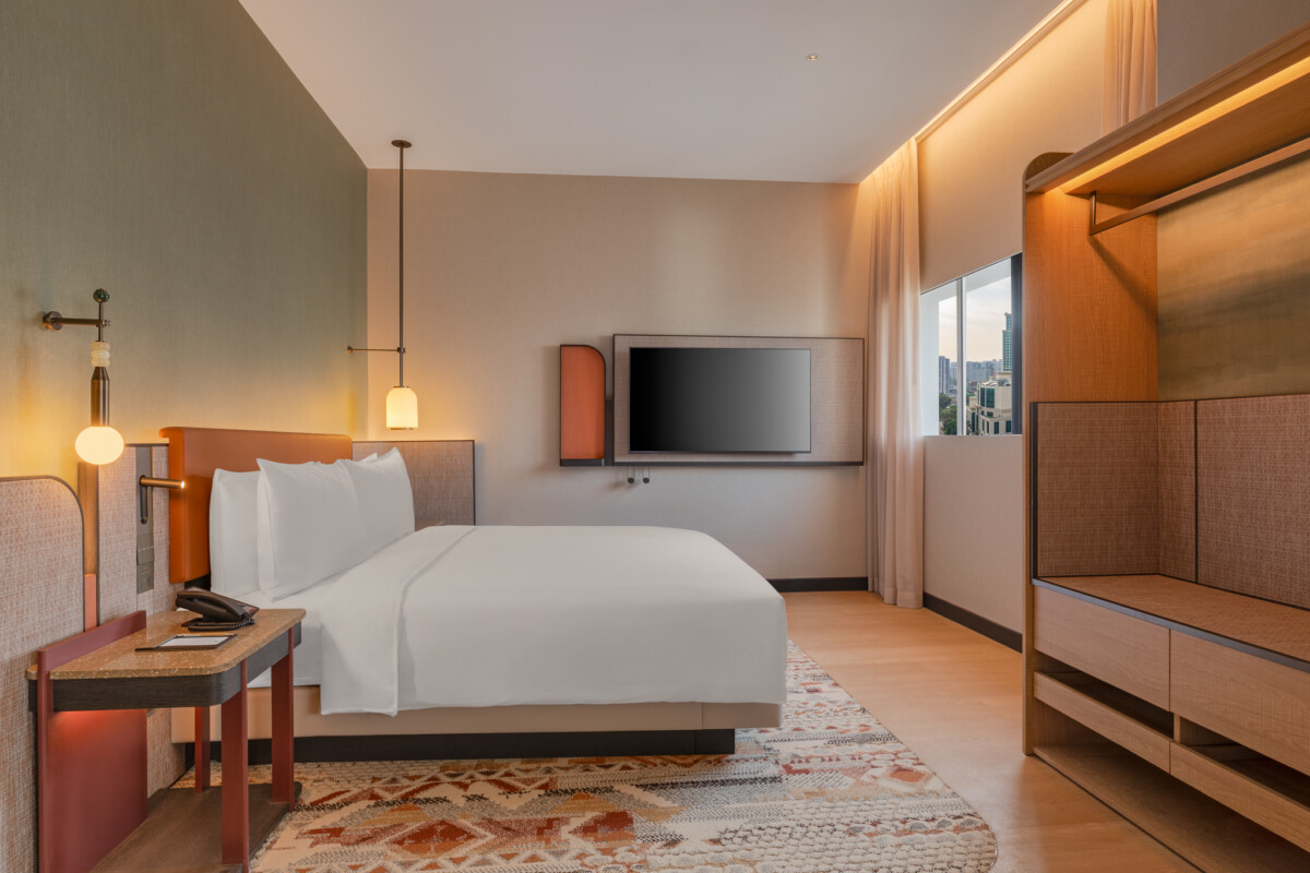 King Deluxe Room with river view and sofa bed at DoubleTree Robertson Quay