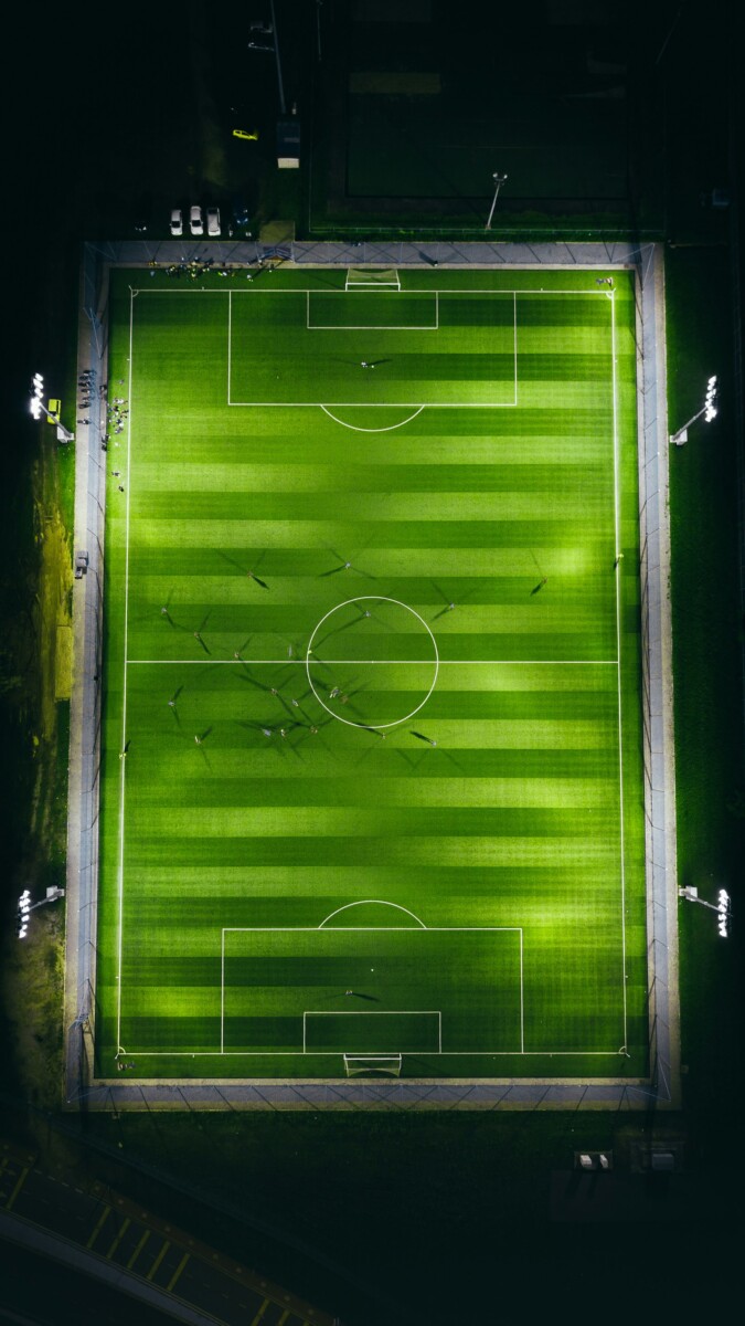 Aerial view of football pitch representing England tactical formation under Tuchel