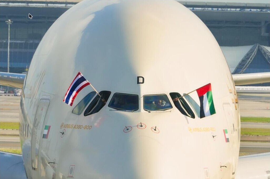 Etihad A380 cockpit with Thai and UAE flags at Bangkok airport