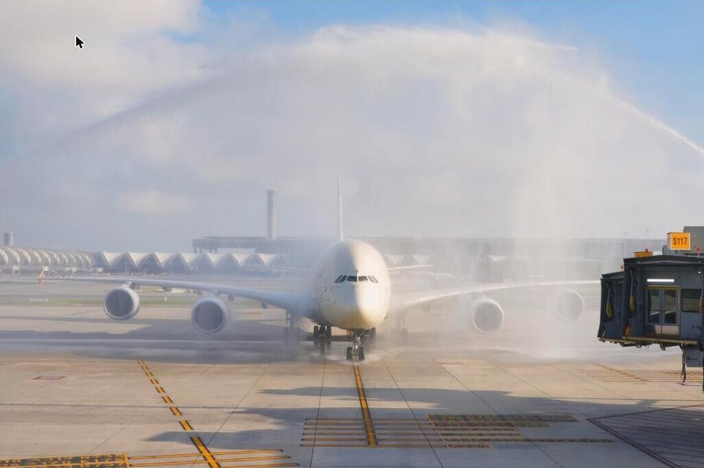 Etihad A380 receiving a water cannon salute on arrival at Bangkok airport