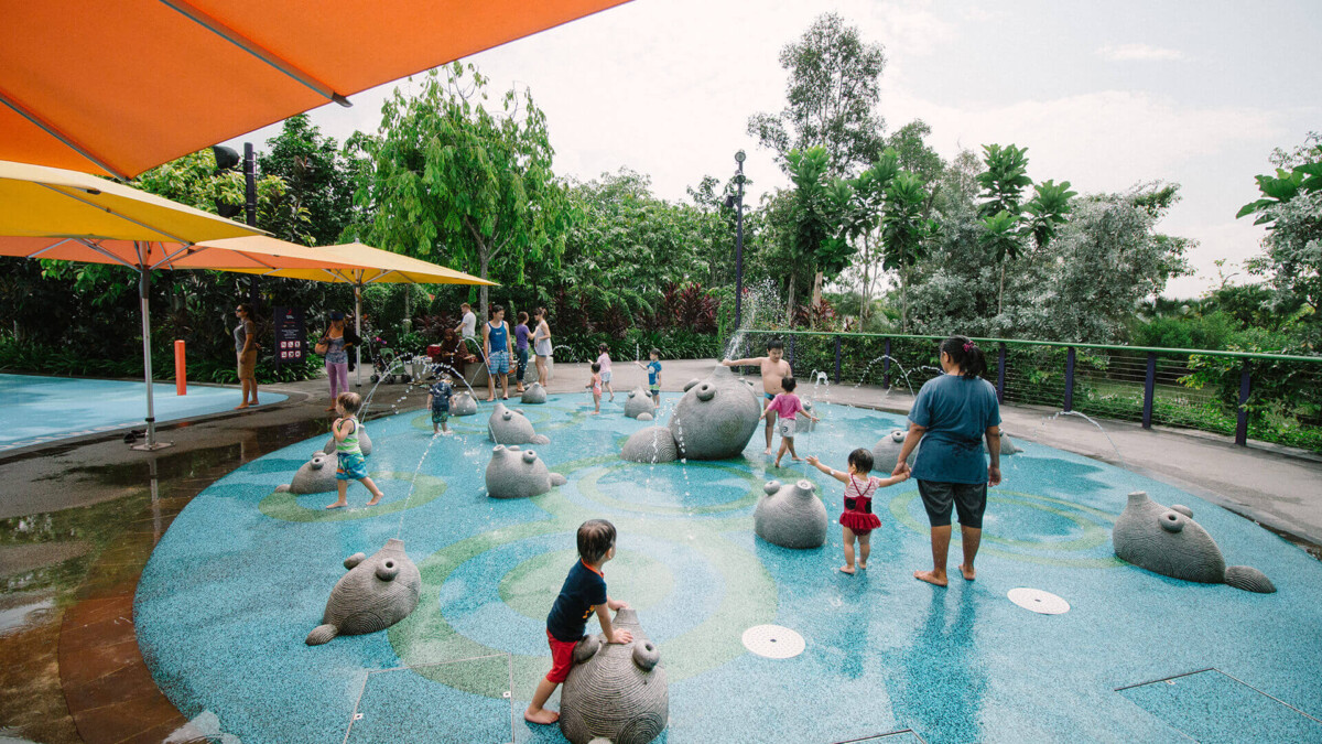 Toddlers splashing at the Toddler Play Zone in Far East Organization Children's Garden at Gardens by the Bay