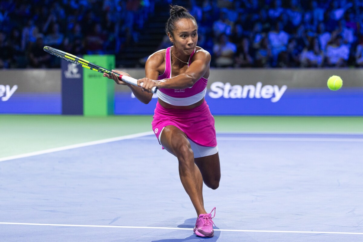 Leylah Fernandez stretches for a backhand during her Singapore Tennis Open quarter-final