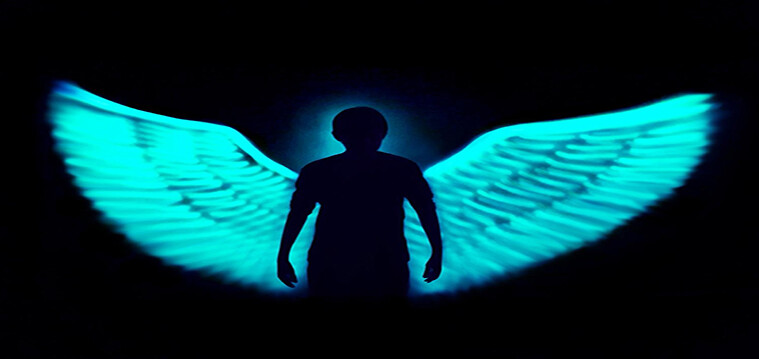 Light painter Lawrence Koh performing a marine-life story at Singapore Oceanarium