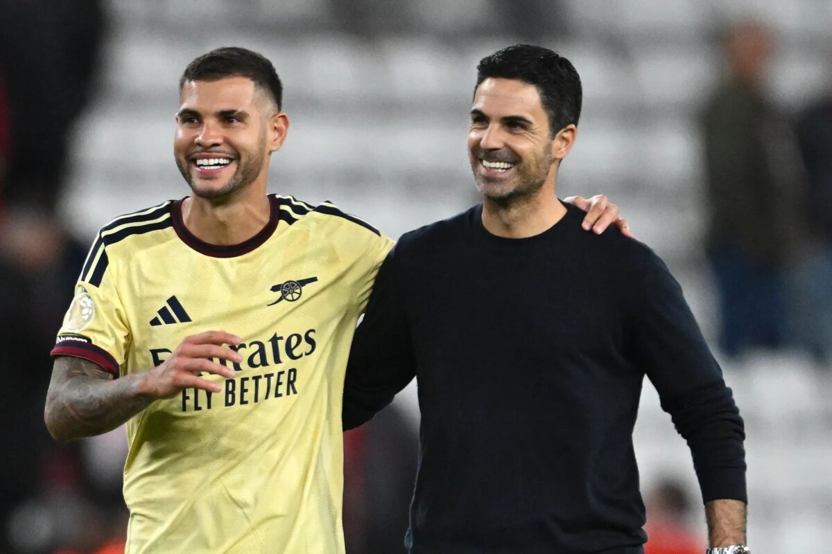 Bruno Guimaraes and Mikel Arteta celebrate Arsenal win at Sunderland