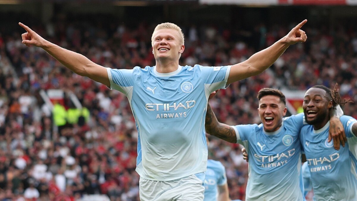 Erling Haaland celebrates after scoring for Manchester City at Old Trafford