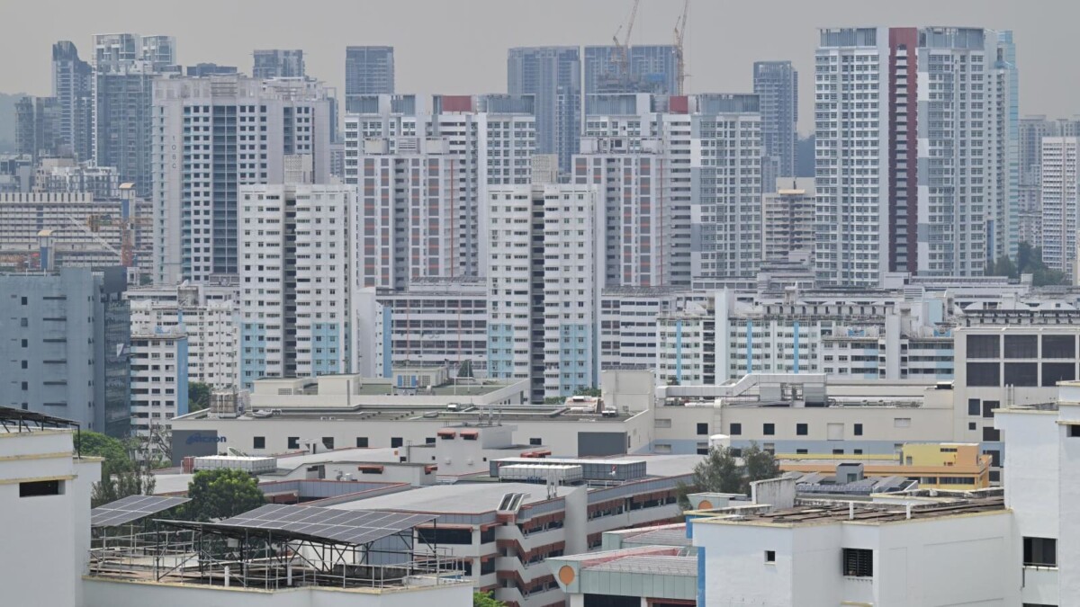 HDB residential blocks in Singapore under cloudy sky