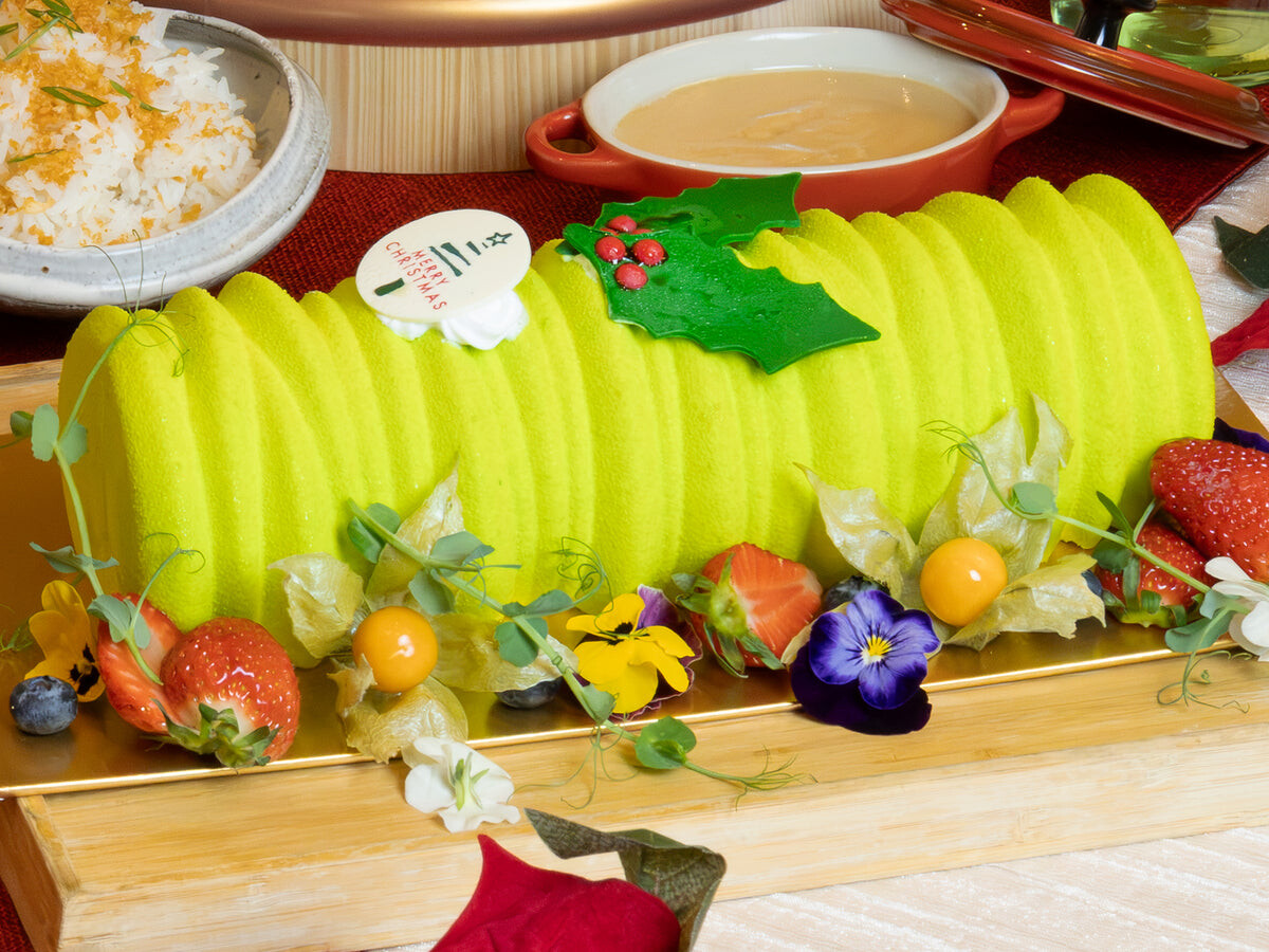 Holiday Inn Singapore Atrium Calamansi and Caramel Miso Log Cake in green with flowers and berries