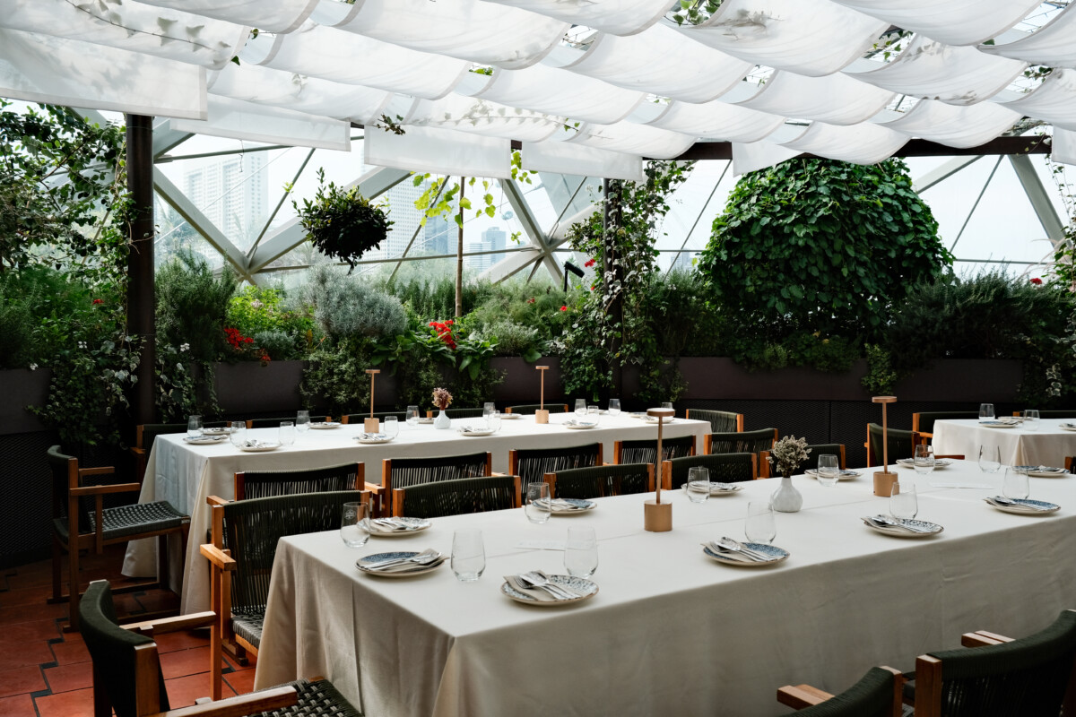 Hortus restaurant event setup inside the greenhouse dome at Gardens by the Bay