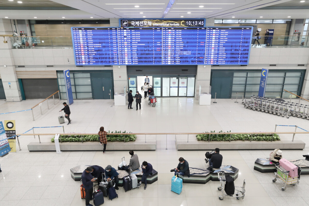 Korea e-Arrival Card waits at Incheon Terminal 1 after a Singapore arrival