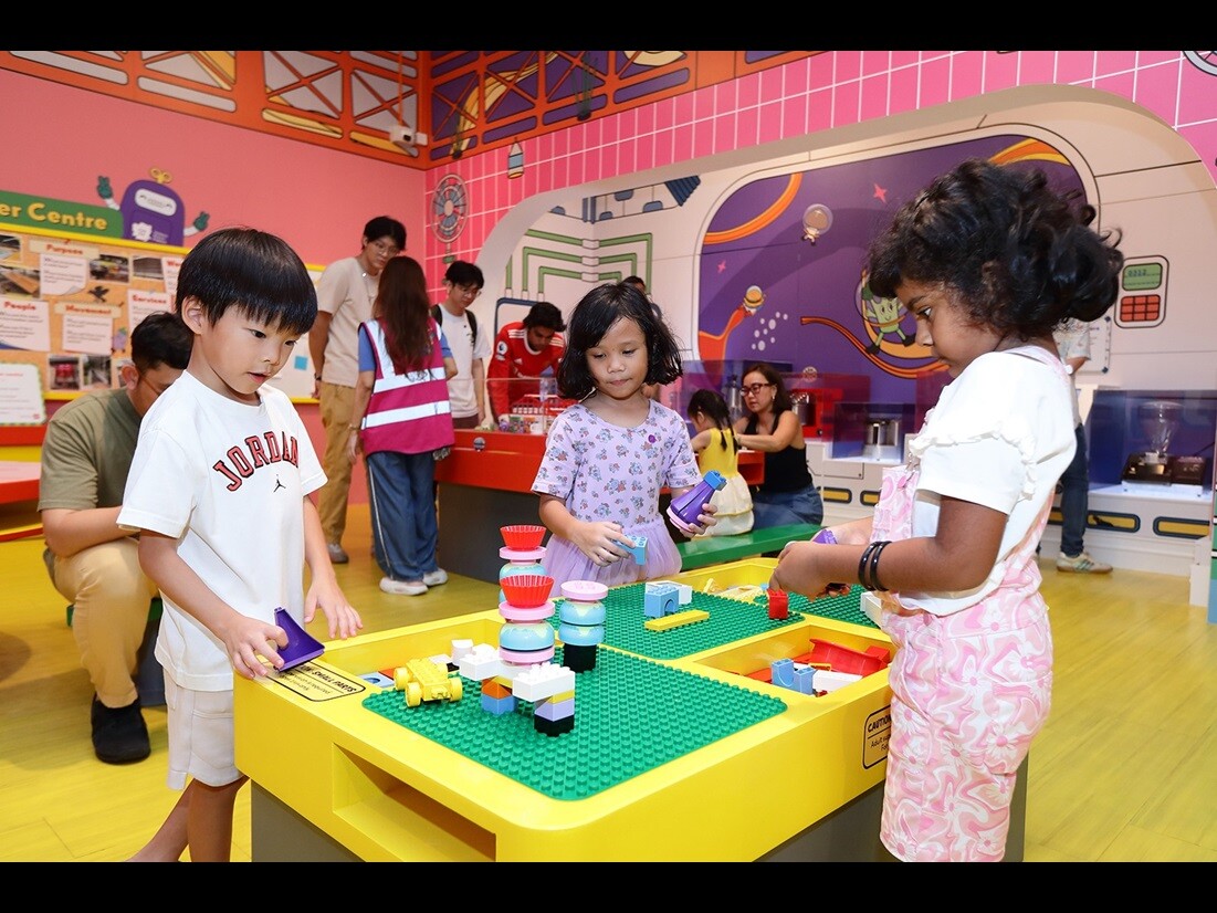 Children exploring Into The Hawkerverse play area