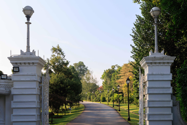 The tree-lined driveway beyond the Istana main gate on Orchard Road
