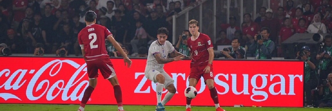 Indonesia and Thailand players contest the ball in the FIFA ASEAN Cup 2026 final at Gelora Bung Karno Stadium