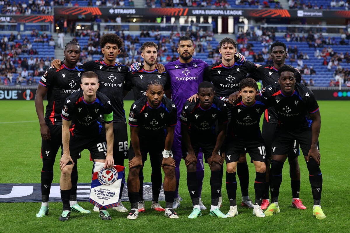 Crystal Palace players contest the ball against Lyon in the Europa League at Groupama Stadium
