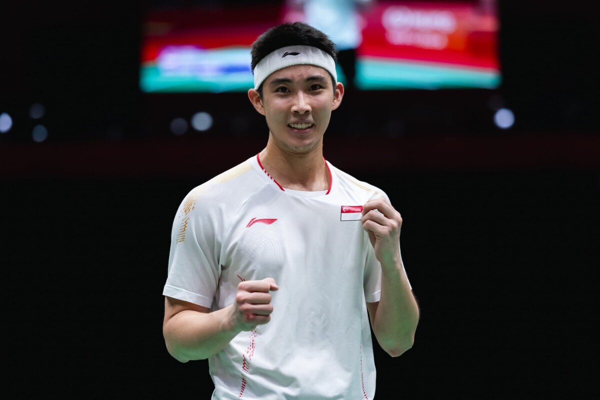Loh Kean Yew celebrates after Asian Games badminton semi-final win for Singapore