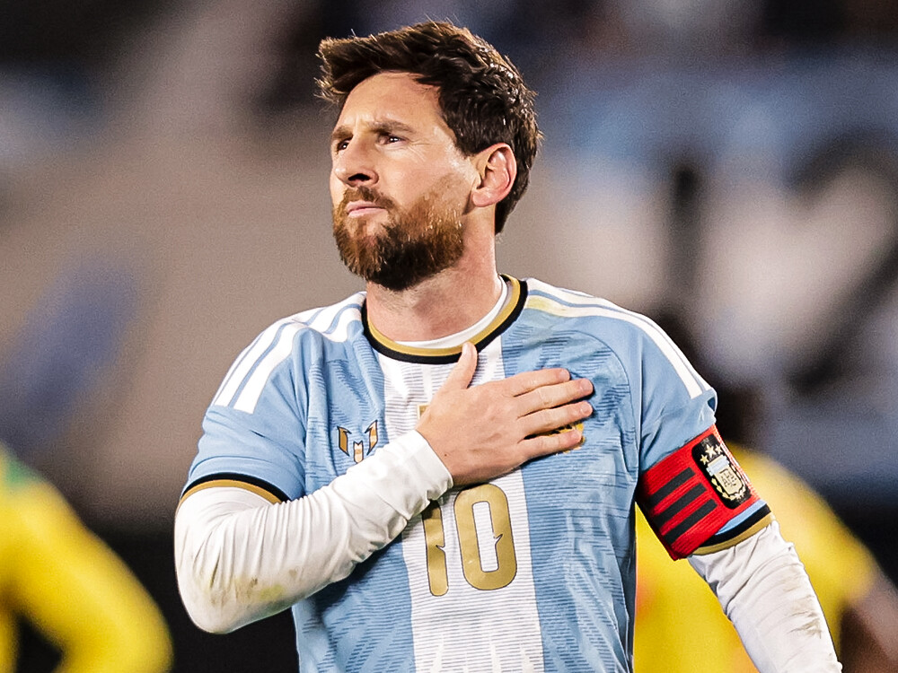 Lionel Messi, hand on chest, during his farewell match for Argentina against Benin at the Monumental