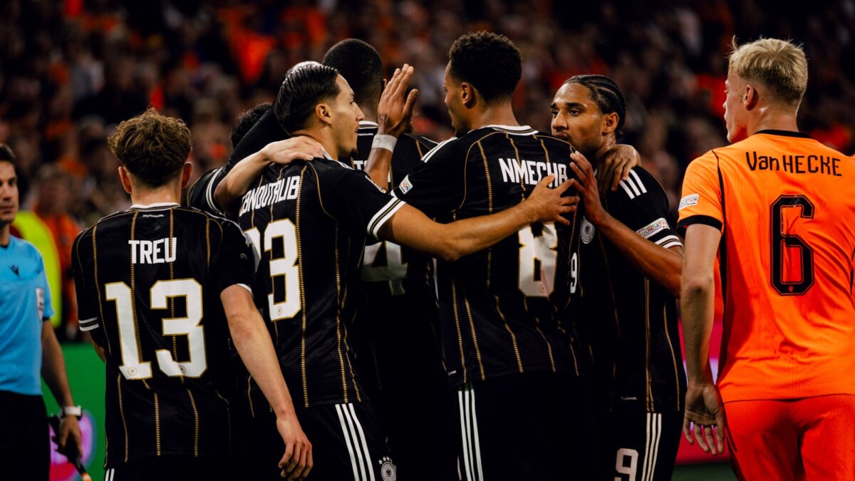 Germany players celebrate Felix Nmecha goal against Netherlands at Johan Cruijff ArenA