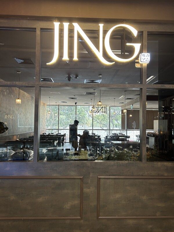 JING Halal Hotpot and Grill storefront with backlit JING signage