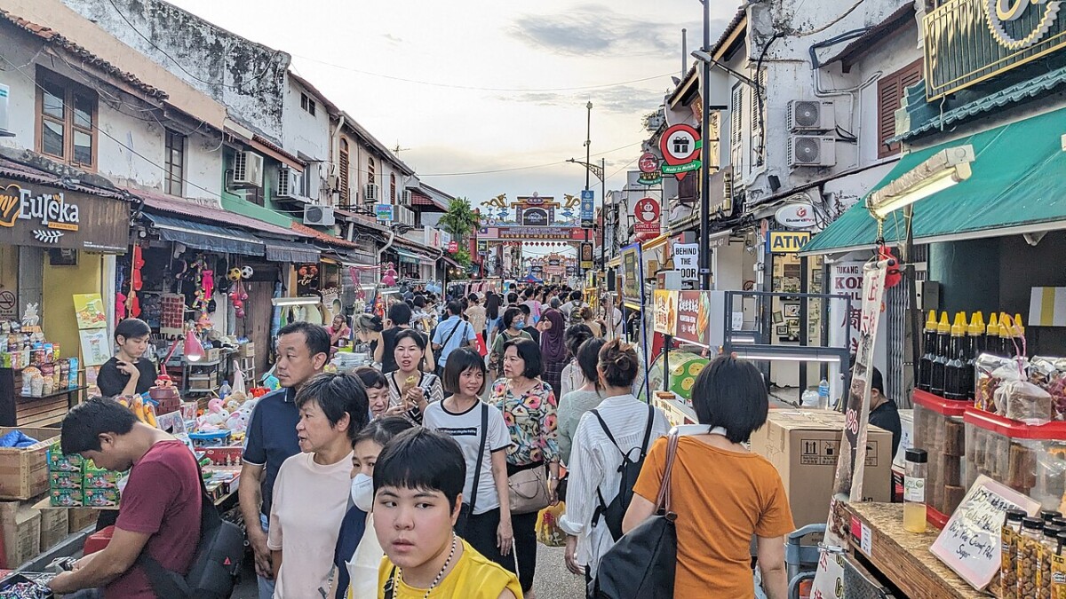 Crowds browsing stalls at Jonker Street Night Market during a Melaka weekend getaway