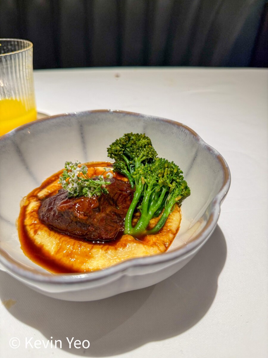 Braised veal cheek with polenta and broccolini at Le Pristine Singapore