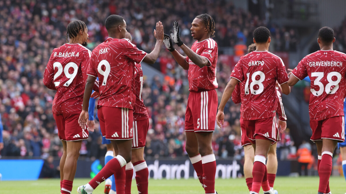 Liverpool players celebrate a goal against Brighton at Anfield