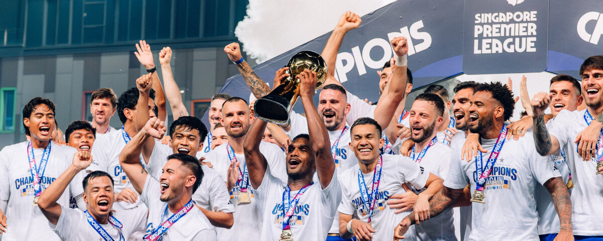 Lion City Sailors players celebrating on the pitch