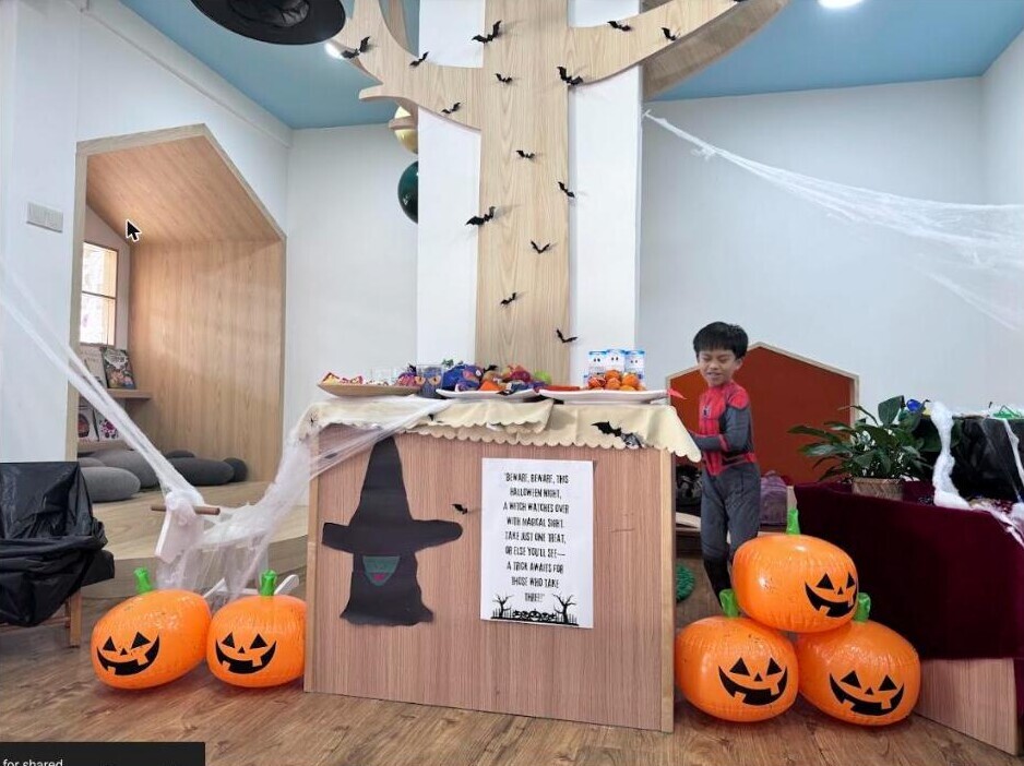 Pumpkin decorations and treat table at a Little Paddington Preschool Halloween event