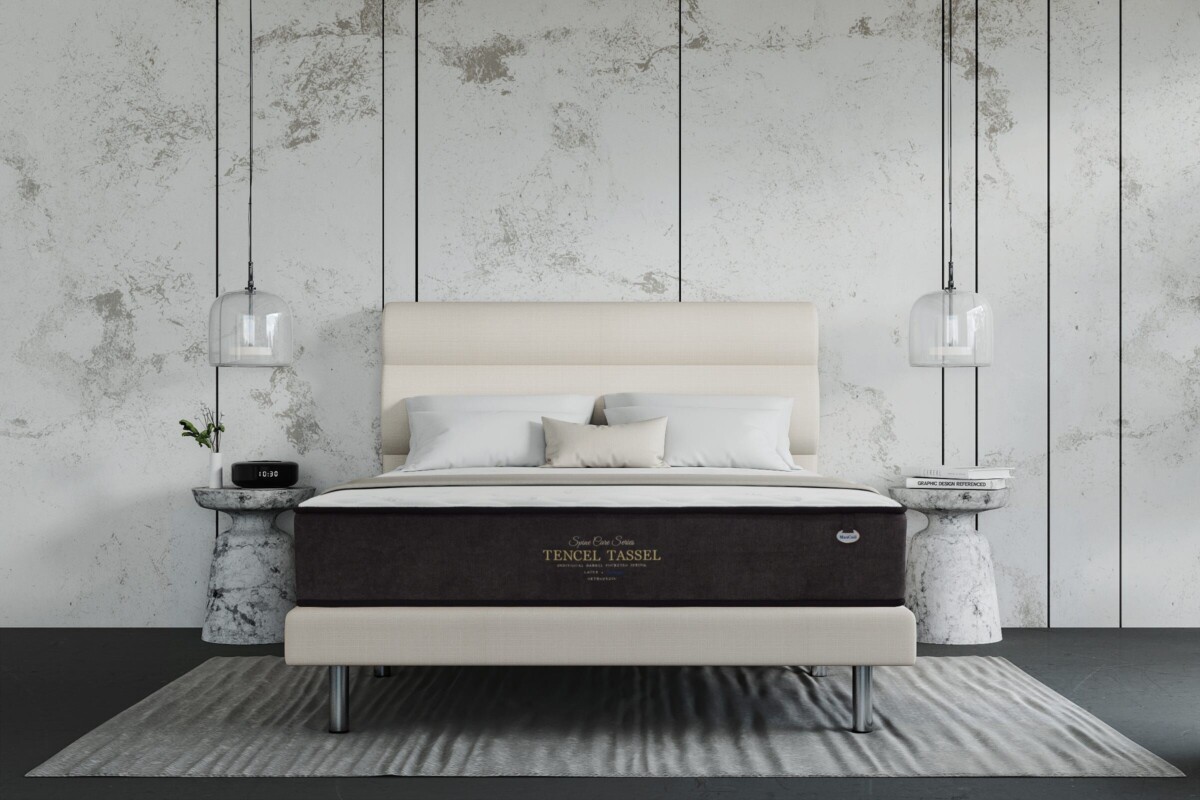 Side view of Maxcoil Spinecare Tencel Tassel mattress showing thickness