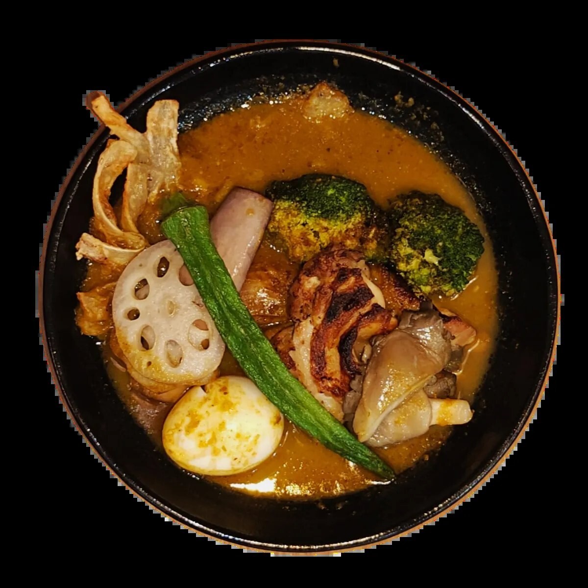 Sapporo soup curry bowl with lotus root, okra, egg, broccoli and chicken