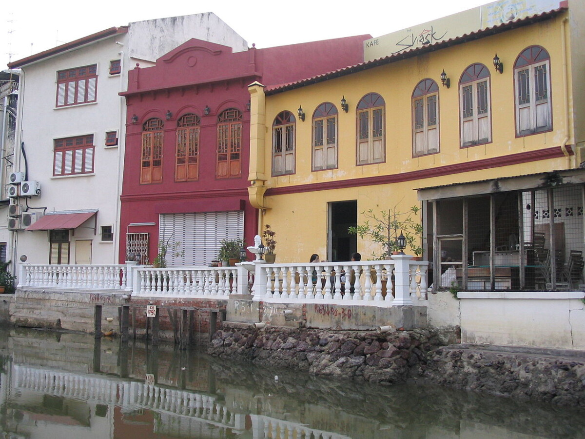 Melaka weekend getaway river cruise past restored heritage shophouses