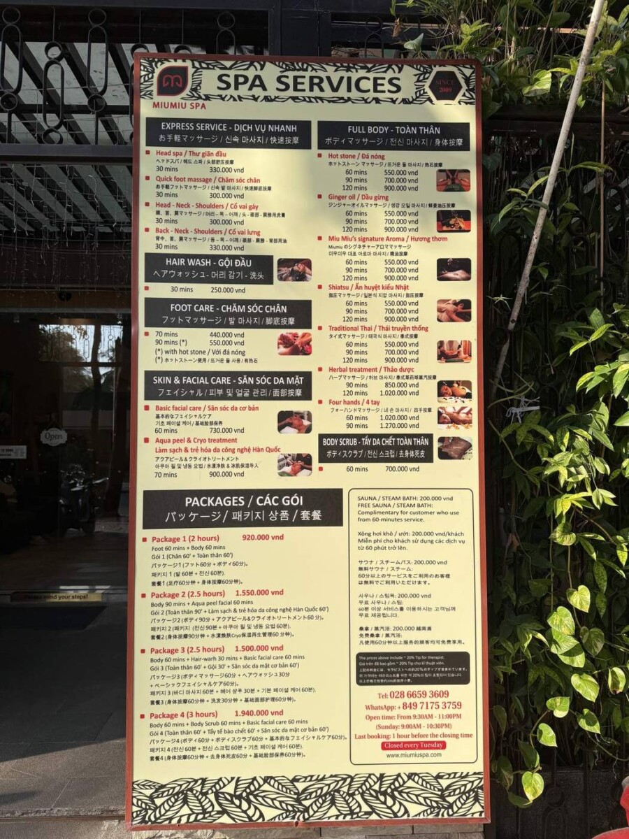 MiuMiu Spa Saigon price board showing 90-minute Foot Care at 550,000 dong per person