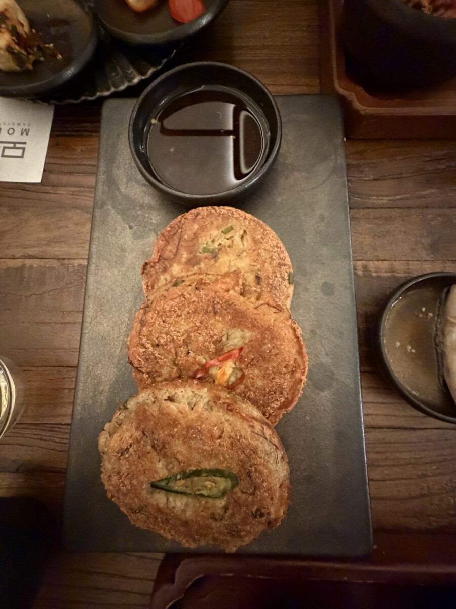 Thick golden Mung Bean Pancake with green chilli served on slate at MODU Samgyetang