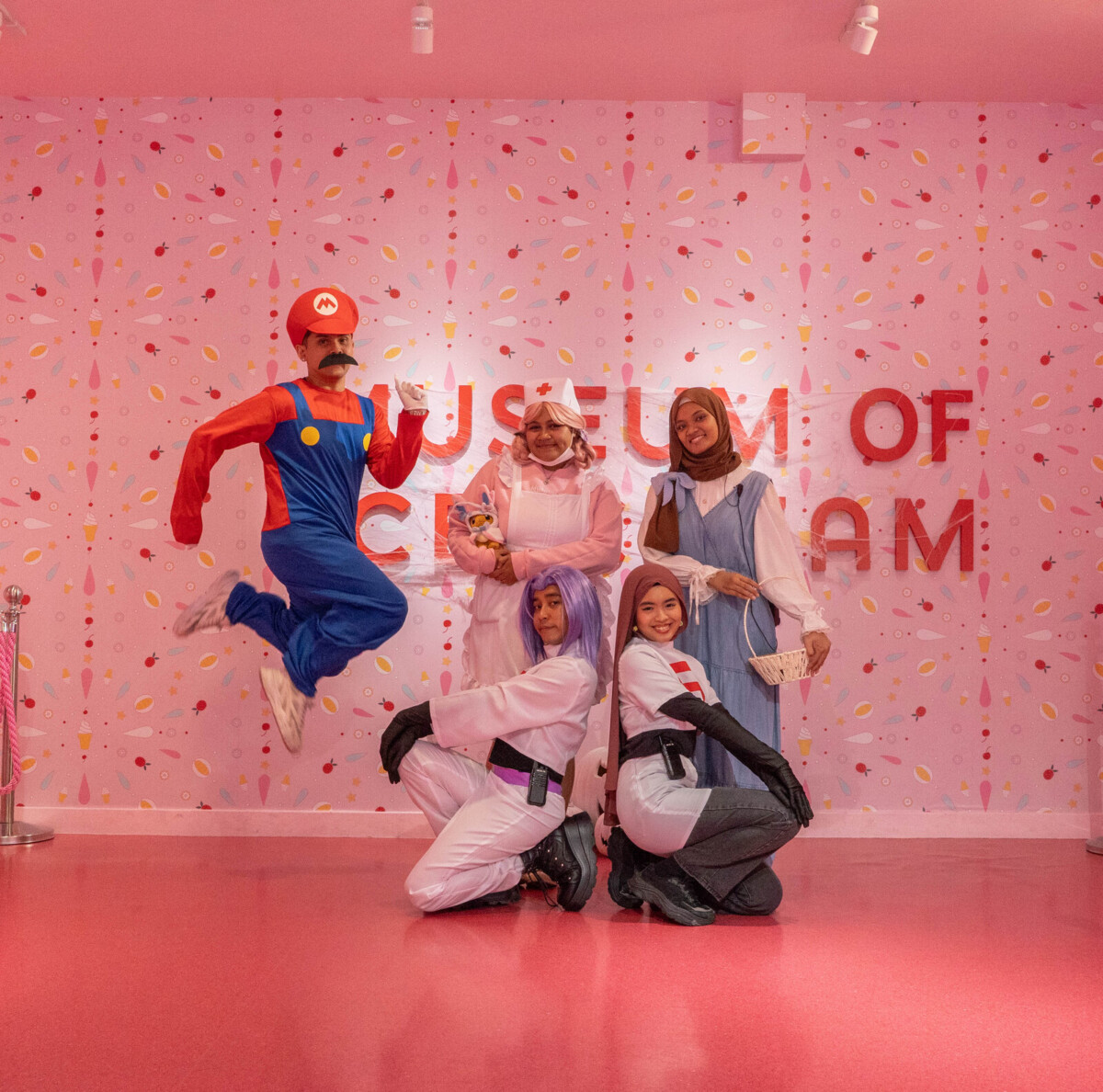 Museum of Ice Cream Halloween 2026 key visual with costumed guests in pink