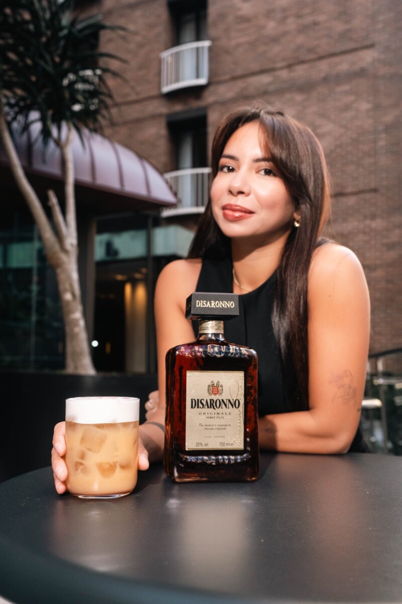 Nathanel Salerno with Disaronno at her Singapore bar takeover